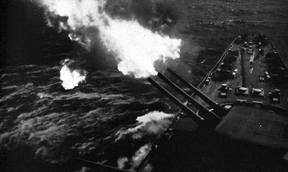 USS North Carolina firing on a target on Okinawa, Japan, 1945