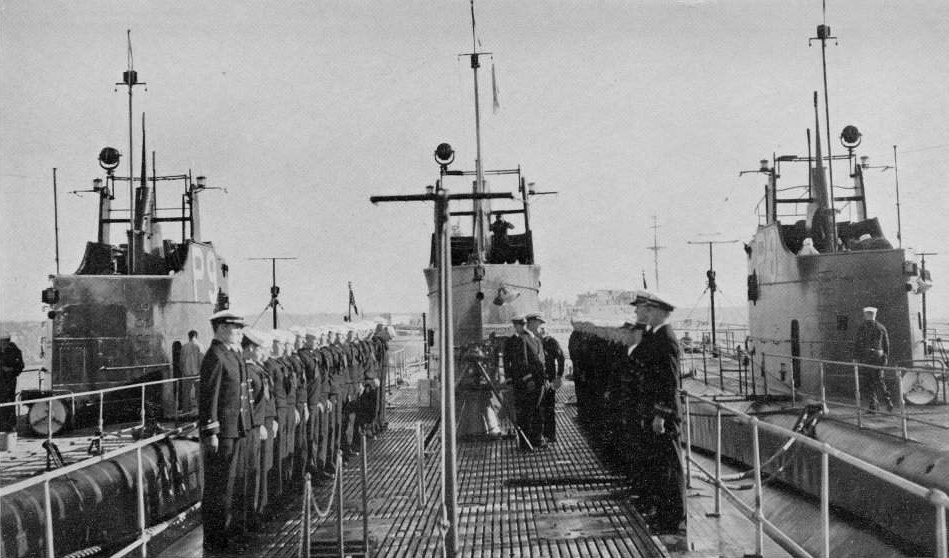 US Navy officers inspecting USS Permit, New York, United States, circa late 1937; note USS Pollack and USS Plunger flanking USS Permit
