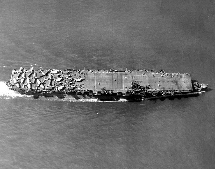 Light Carrier USS Princeton with a deck full of aircraft on her shakedown cruise, 31 May 1943 off Antigua. Photo 1 of 4