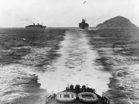 RMS Queen Mary (right), RMS Queen Elizabeth (left), and HMAS Sydney (foreground) off Wilson's Promontory, Victoria, Australia, 4 Sep 1941
