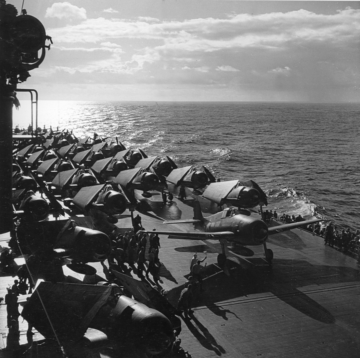 F6F-3 Hellcat fighters preparing for launch aboard USS Saratoga, 1943-1944