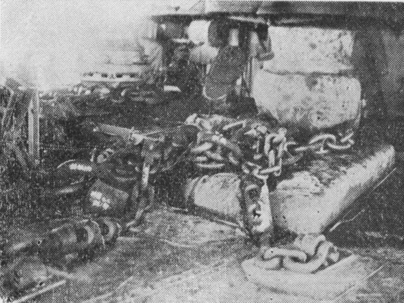 View of damaged anchor chains of Shokaku, cut by the first bomb hit received at the Battle of the Coral Sea, Kure, Japan, between 17 May and 27 Jun 1942