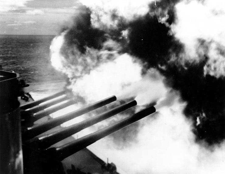 South Dakota's 16-in guns bombarding Kamaishi, Japan, Jul 1945