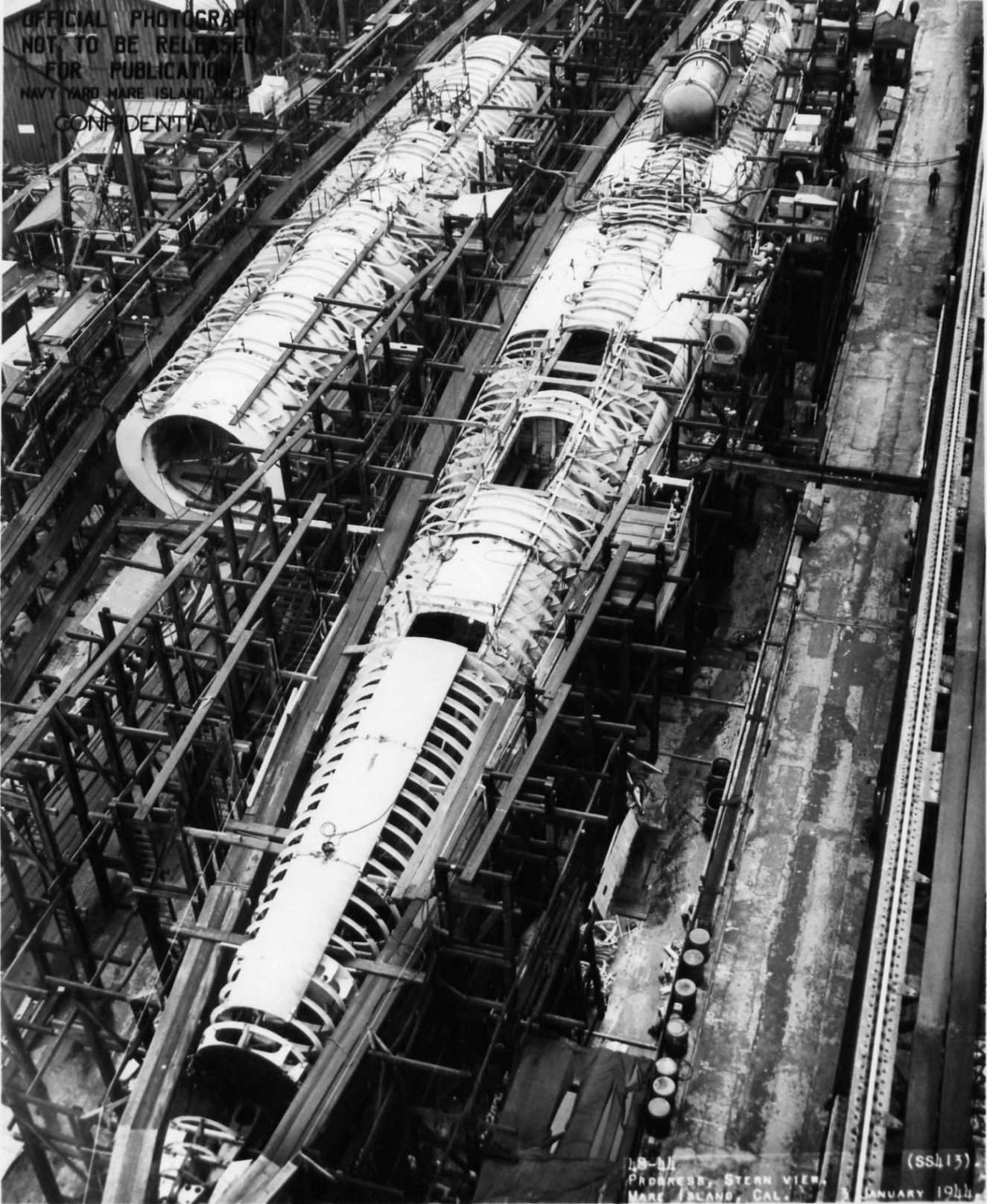 Submarines Springer (less complete) and Spot under construction, Mare Island Naval Shipyard, Vallejo, California, United States, 3 Jan 1944, photo 3 of 4