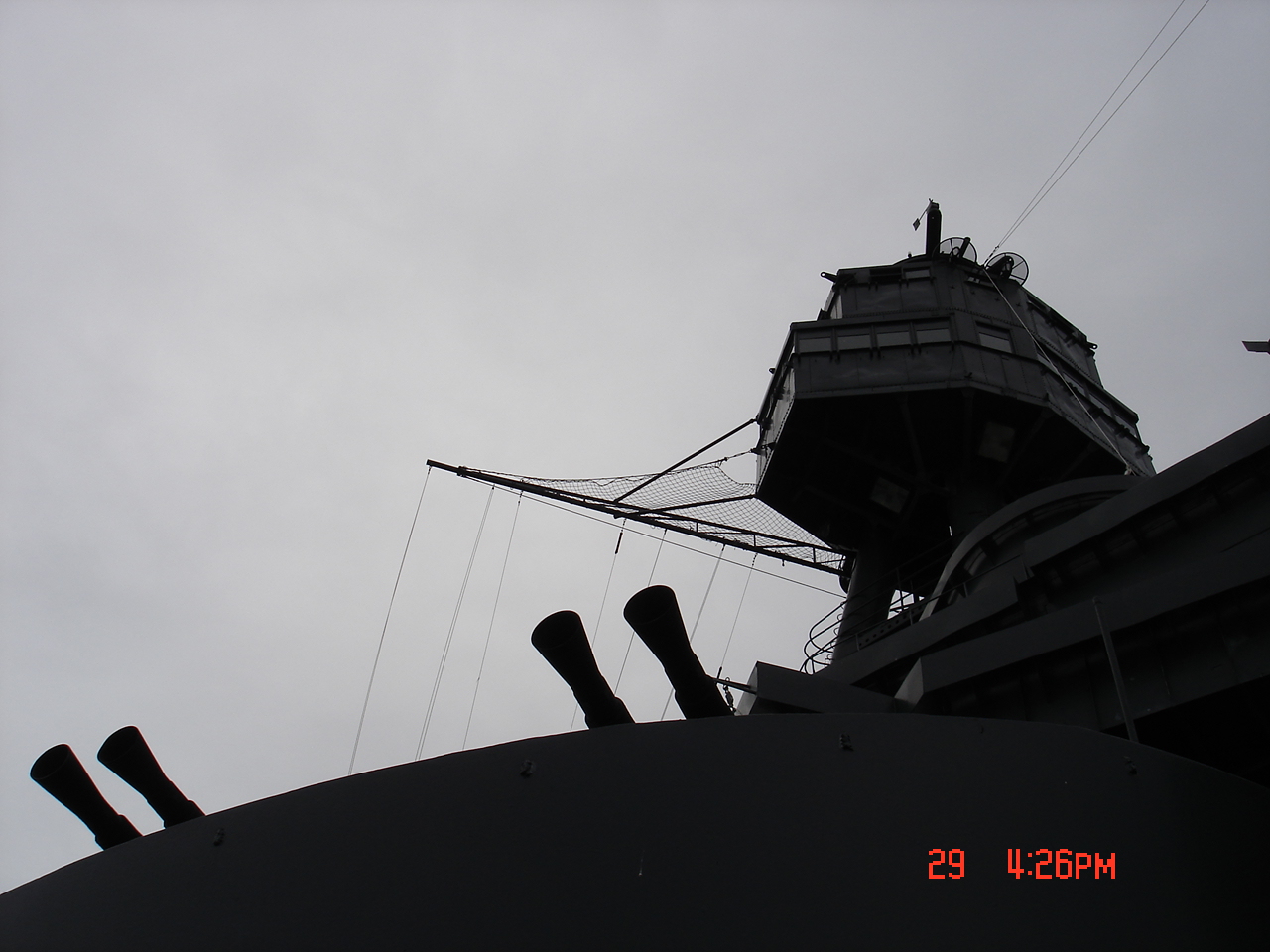 View up superstructure of USS Texas, 2007; note the muzzle of 40mm anti-aircraft guns, the foremast, and the spotters' stations