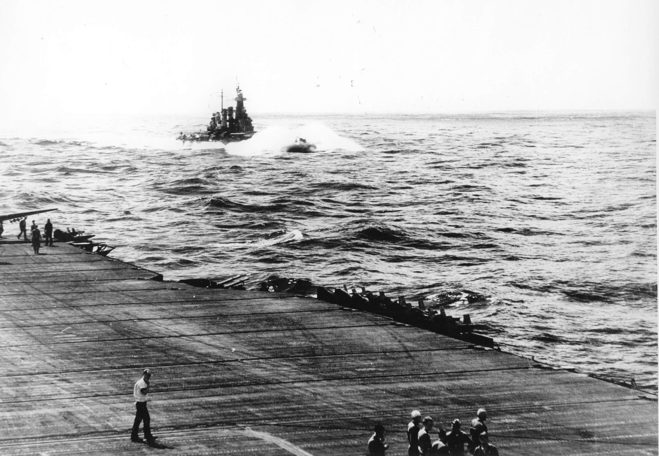 USS North Carolina in heavy seas as seen from USS Ticonderoga, off the Philippine Islands, 12 Dec 1944