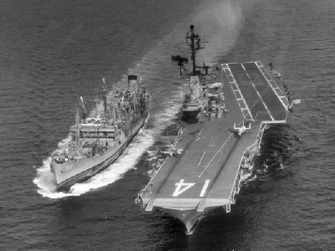 USS Ticonderoga receiving fuel from USS Manatee, 15 Jul 1965
