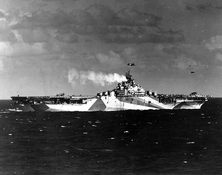 Carrier Ticonderoga at sea off the Philippine Islands, 5 Nov 1944; note camouflag pattern Measure 33 Design 10a