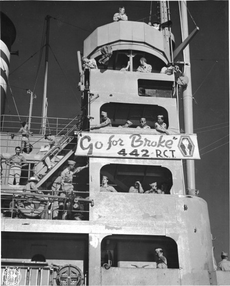 US 442nd Regimental Combat Team, consisted of Japanese-Americans, displaying their slogan 'Go for Broke' at the bridge of Victory Ship SS Waterbury Victory, Honolulu, US Territory of Hawaii, 9 Aug 194