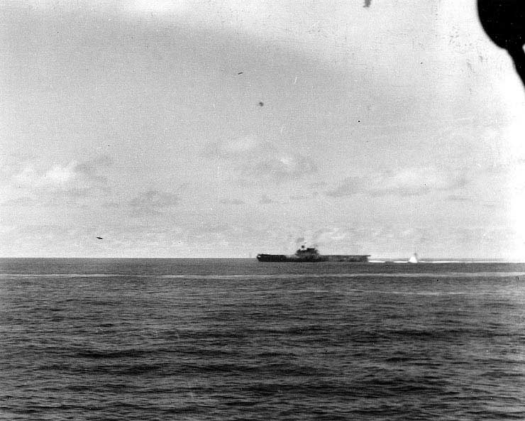 A Type 99 dive bomber attacked Yorktown, seen from cruiser Astoria, 4 Jun 1942