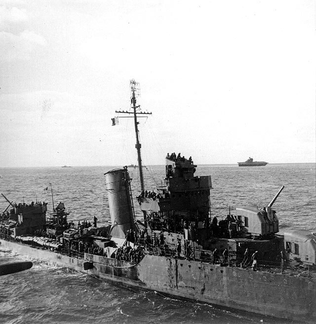 Destroyer Benham with 720 survivors of Yorktown on board, at 1900 on 4 Jun 1942; Yorktown in the distance