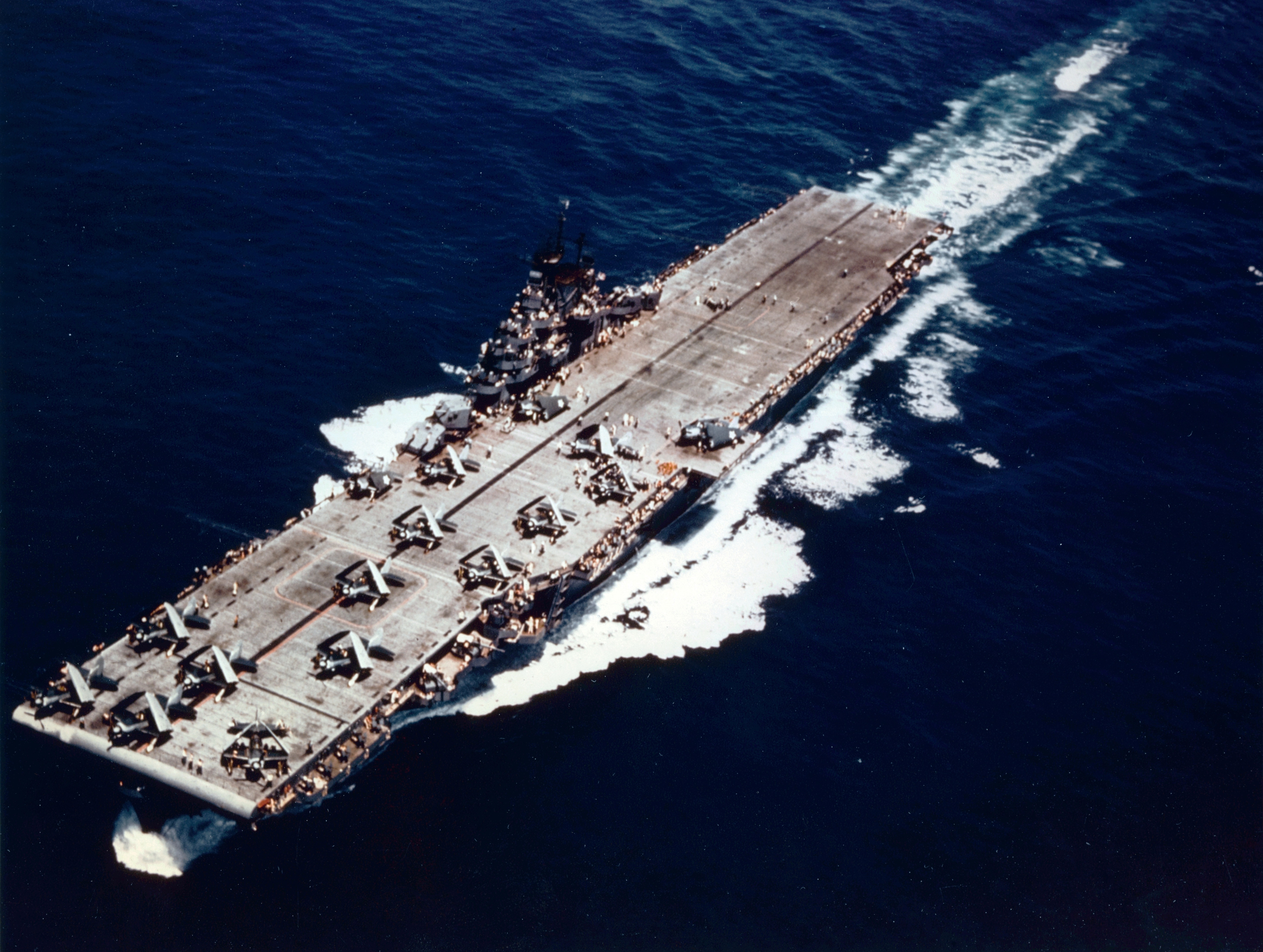 Yorktown (Essex-class; CV-10) circa mid-1943 with Hellcat fighters and Helldiver dive bombers on her flight deck
