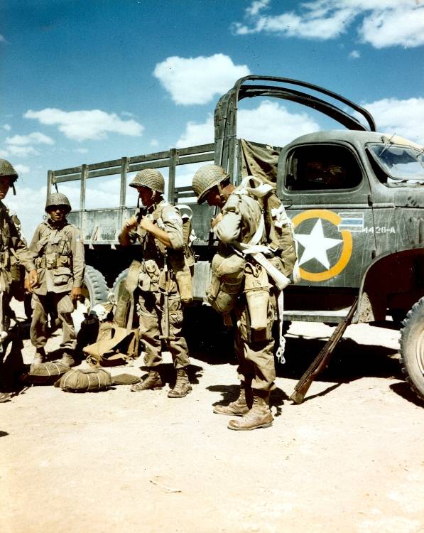 US Paratroopers of the 82nd Airborne preparing for a jump, North Africa, late 1942; note CCKW 2 1/2-ton 6x6 transport truck