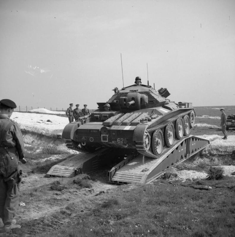Covenanter tank of 6th Guards Armoured Brigade, British Guards Armoured Division crossing a scisssors bridge laid down over an anti-tank ditch, Tilshead, Wiltshire, England, United Kingdom, 25 Jun 1942