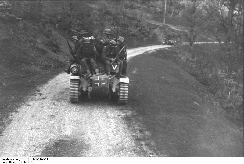 German infantry riding on a Panzerkampfwagen 39H 735(f) tank in the Balkan Peninsula, 1941-1942