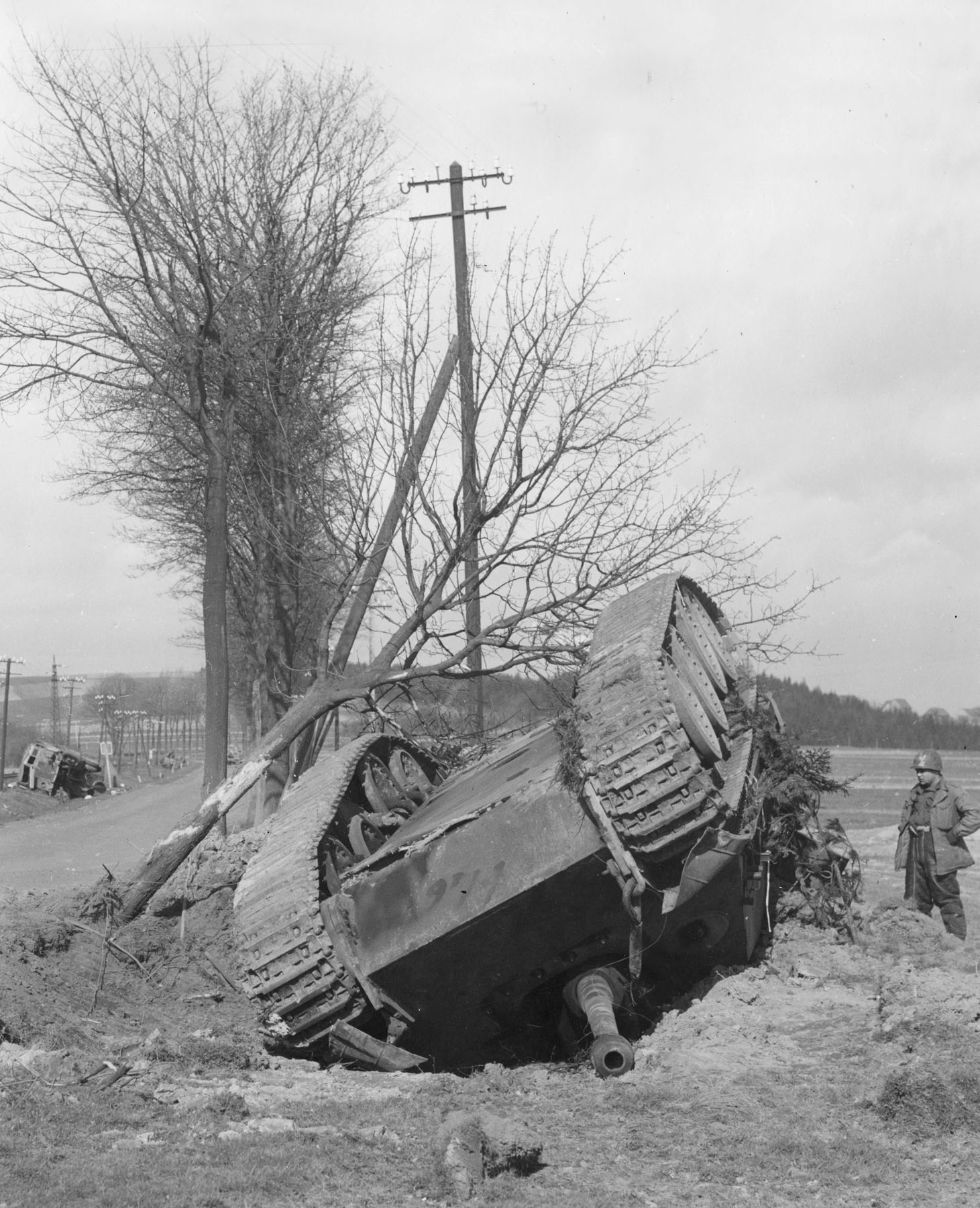 German Jagdpanther tank destroyer flipped over by an aerial bomb, near Altenkirchen, Germany, 1945