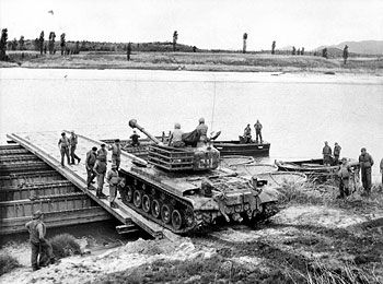 American M46 medium tank being loaded onto a British Army ferry, Korea, 1951