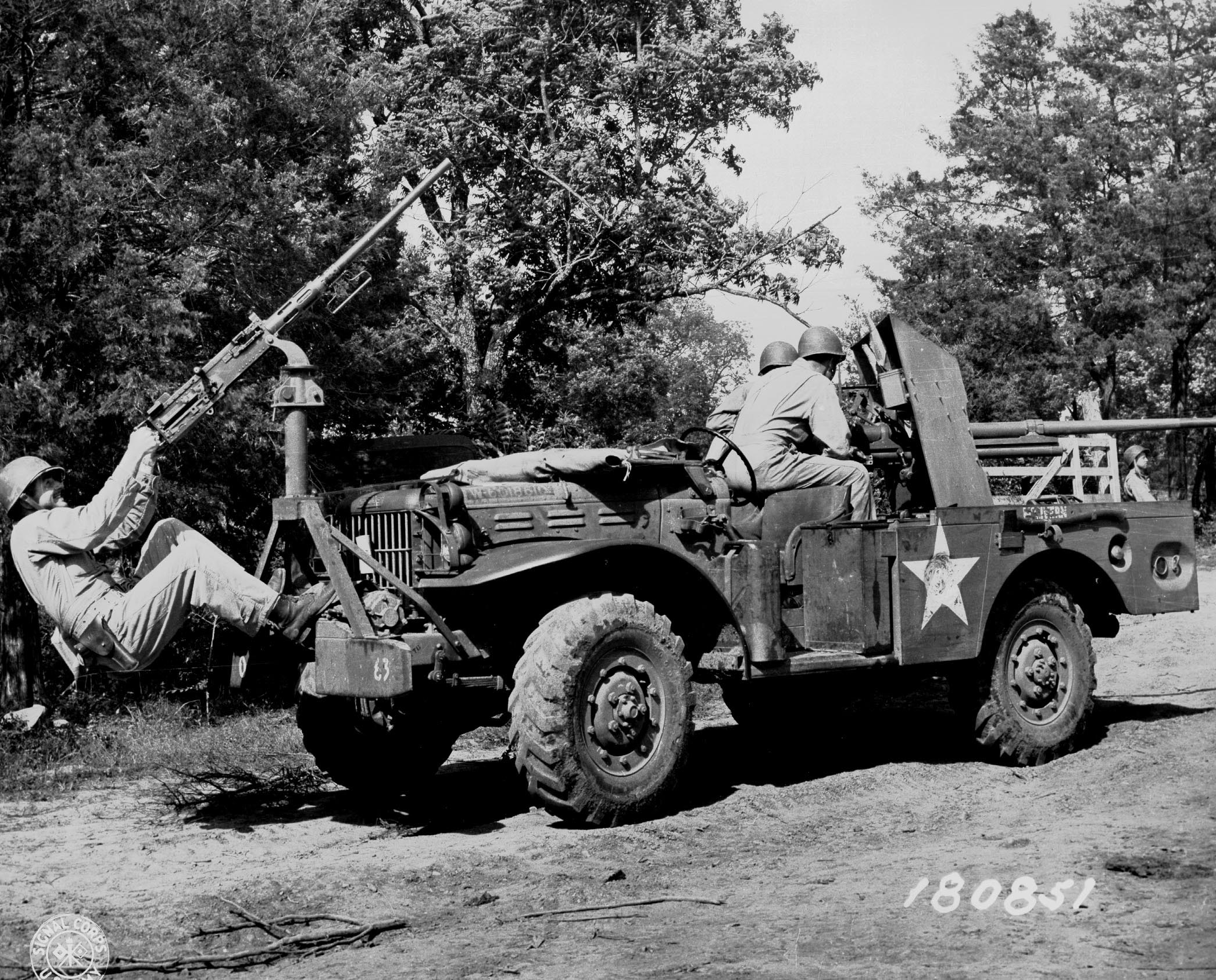 37 mm Gun M3 mounted aboard a M6 Gun Motor Carriage, with additional .50 cal machine gun attached, 3 miles west of Watertown, Tennessee, United States, 6 Jun 1943