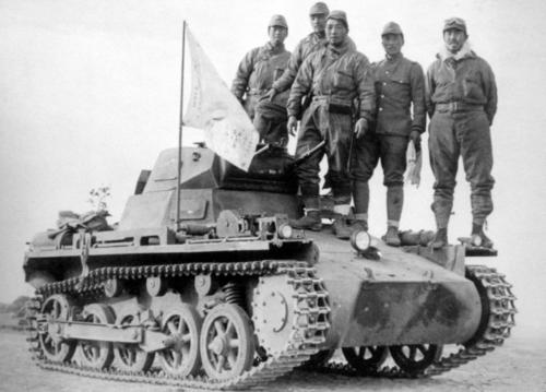 Japanese troops with a captured German-built Chinese Army Panzer I tank, possibly near Nanjing, China, 9 Dec 1937
