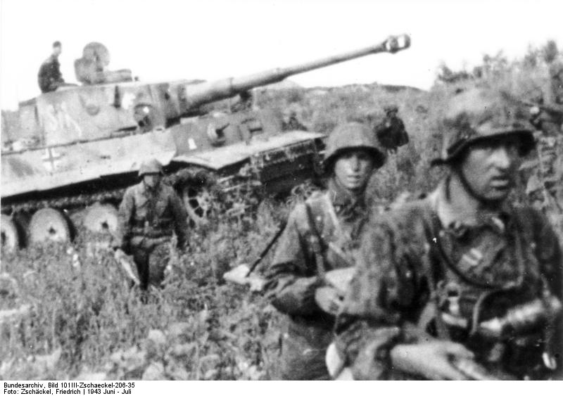 German troops and Tiger I heavy tank of the German 2nd SS Panzer Division 'Das Reich' on the move near Kursk, Russia, Jun-Jul 1943