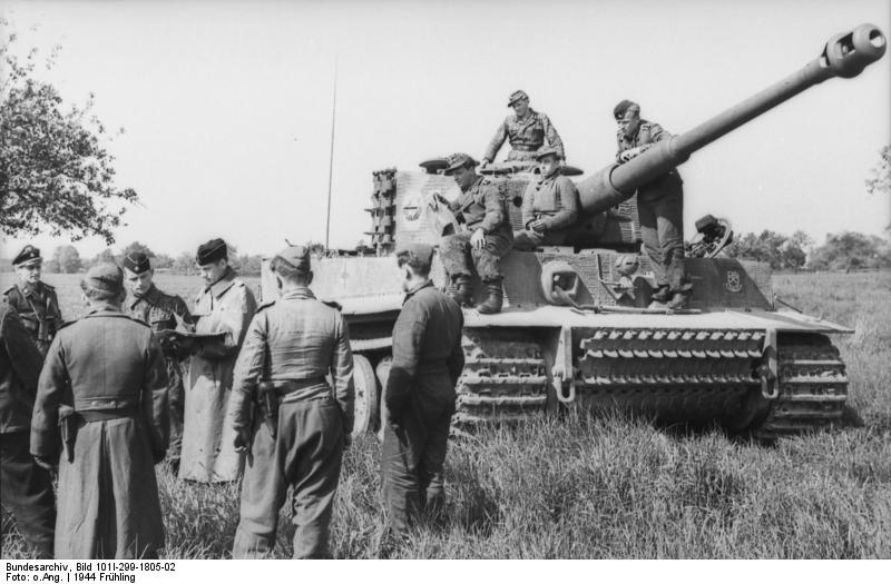 Tiger I heavy tank and crew of the German 1st SS Division Leibstandarte SS Adolf Hitler in Northern France, spring 1944, photo 1 of 2
