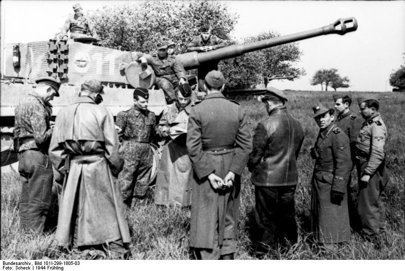 Tiger I heavy tank and crew of the German 1st SS Division Leibstandarte SS Adolf Hitler in Northern France, spring 1944, photo 2 of 2