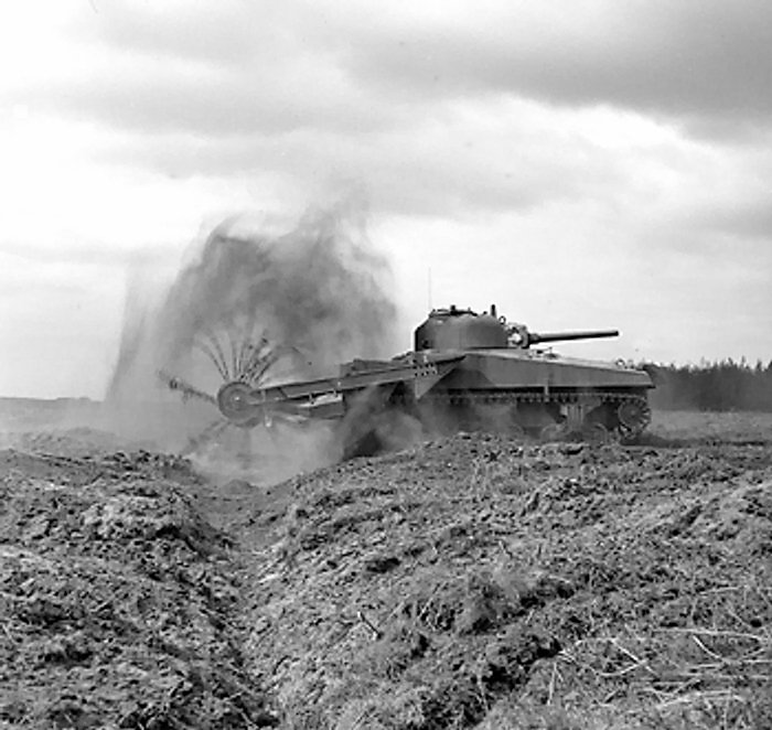 Sherman Crab flail tank under test with the UK 79th (Experimental) Armored Division Royal Engineers, 27 Apr 1944