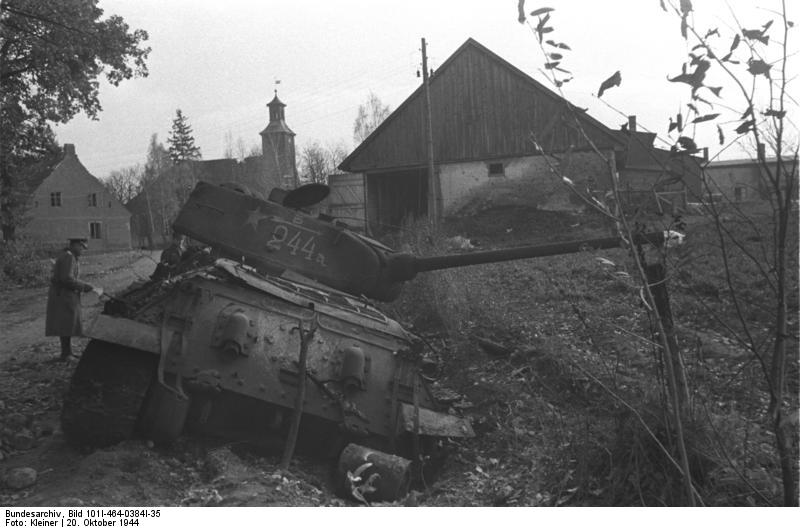 Wrecked Soviet T-34-85 tank at the outskirts of Nemmersdorf, East Prussia, Germany, late Oct 1944, photo 3 of 3