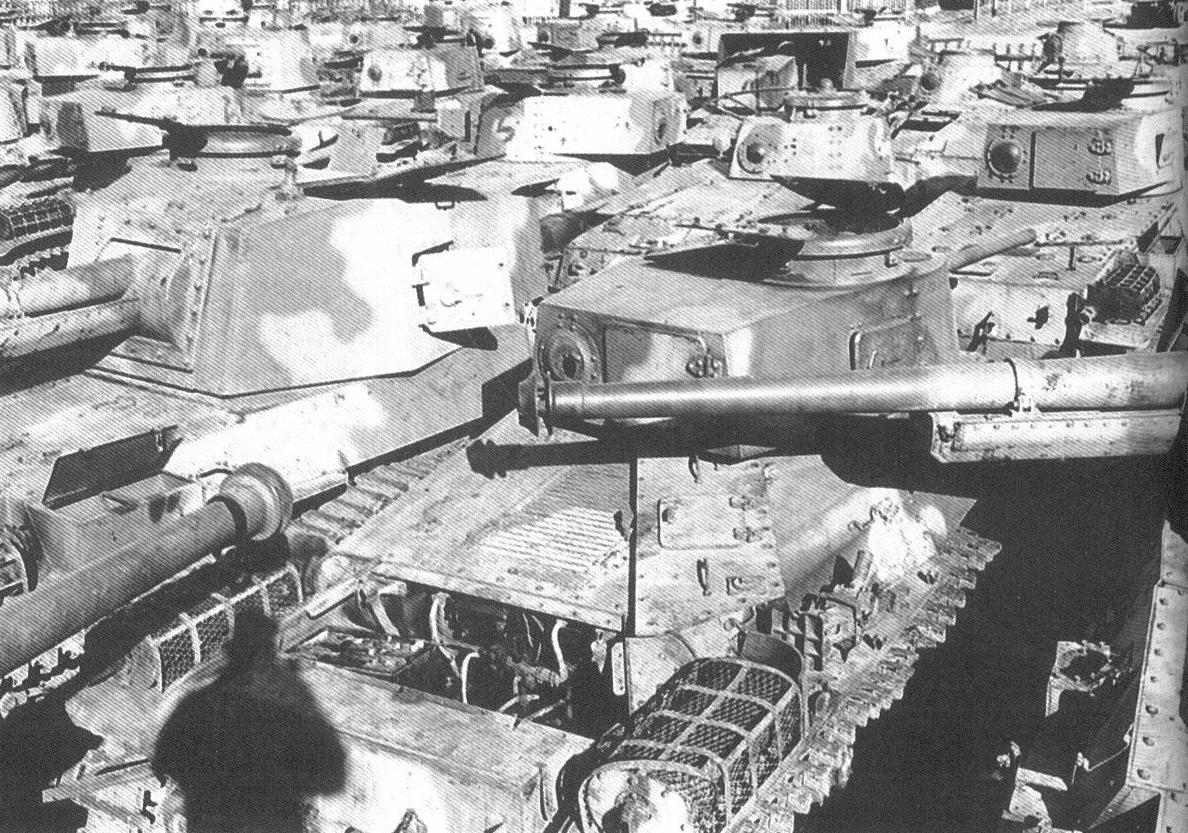 Type 3 Chi-Nu, Type 97 Chi-Ha, Type 1 Chi-He, Type 3 Ho-Ni III, and other vehicles in a depot in Japan, circa 1946