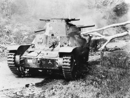 Japanese Type 95 Ha-Go light tank knocked out by Australian anti-tank fire during Battle of Muar in Malaya, late Jan 1942