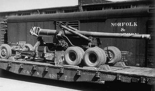 155mm Gun M1 arriving by rail at Hampton Roads Port of Embarkation, Newport News, Virginia, United States, 6 Aug 1943