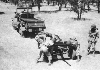 Anti-tank company of 1st Filipino Infantry Regiment in exercise with 37 mm Gun M3, 1943, photo 1 of 5