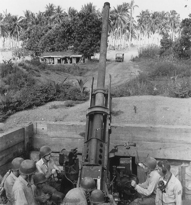 Men of US Marine Corps 3rd Defense Battalion operating a 90mm M2 Anti-Aircraft Gun, Guadalcanal, Solomon Islands, 1942