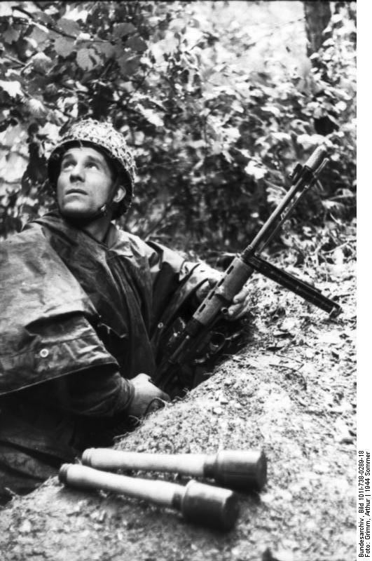 German paratroopers in France, summer 1944; note FG 42 rifle and Model 24 grenades