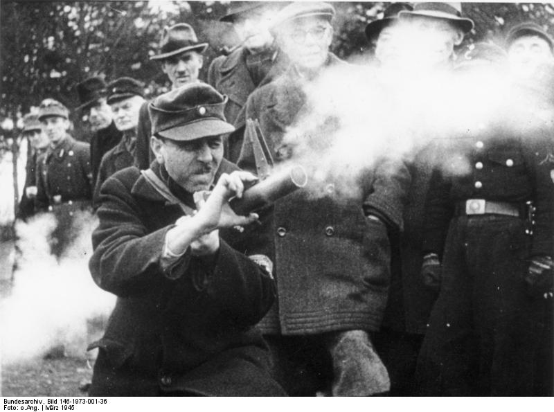 German Volkssturm soldier firing a Panzerfaust in training, Germany, Mar 1945
