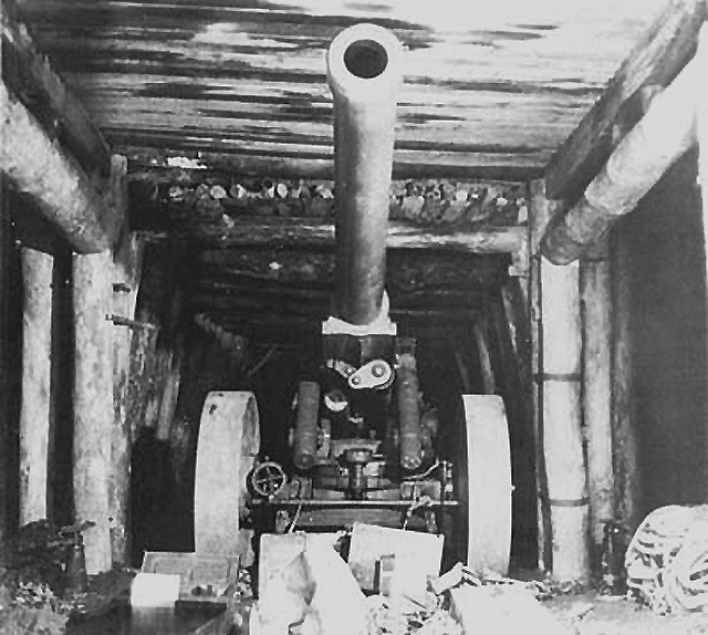 Japanese 15cm cannon in a cave at Motobu Peninsula, Okinawa, Japan, 1945